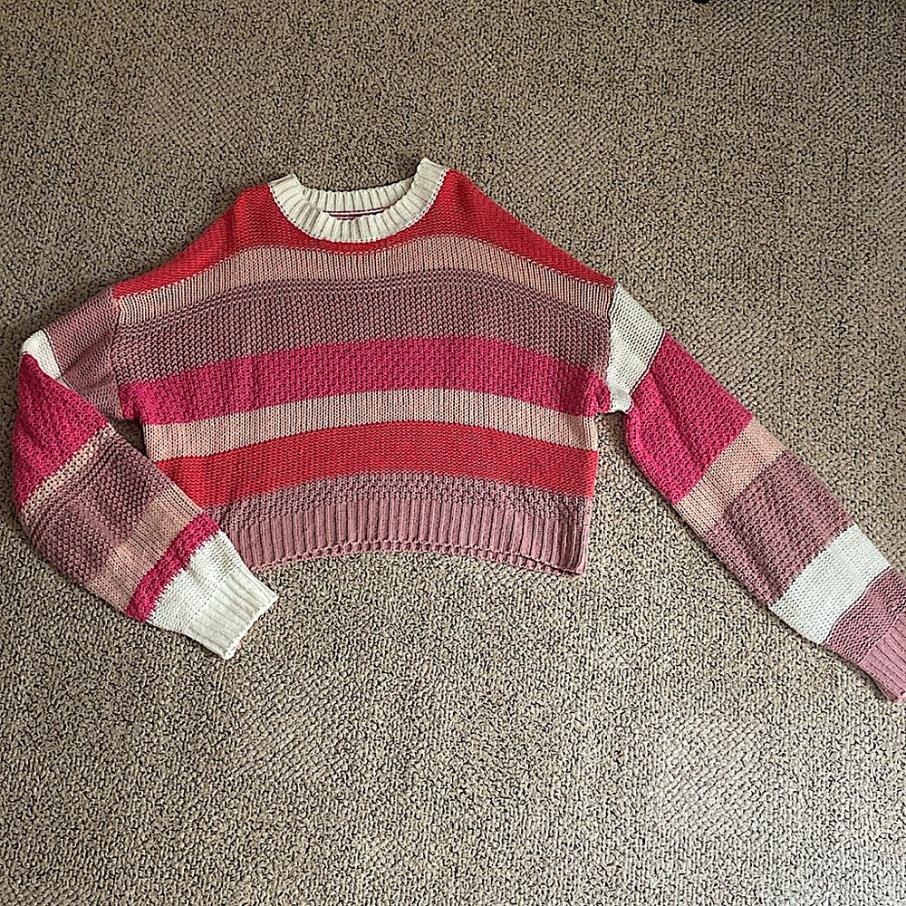 This is a sweater from SHEIN with various shades of pink.